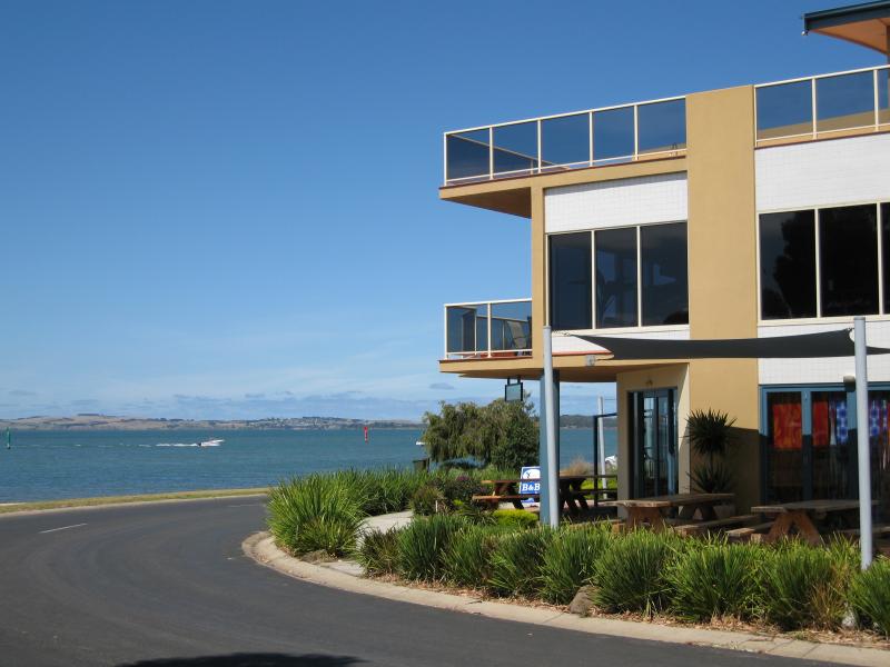 Rhyll - Shops and coast along Beach Road between Reid Street and boat ramp: View to coast from shops on corner of Beach Rd and Lock Rd