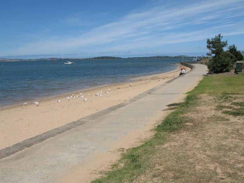 Rhyll - Shops and coast along Beach Road between Reid Street and boat ramp: View south along beach