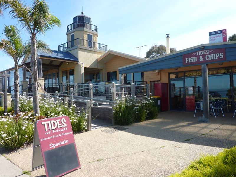 Rhyll - Shops and coast along Beach Road between Reid Street and boat ramp: Restaurants, view south along Beach Rd