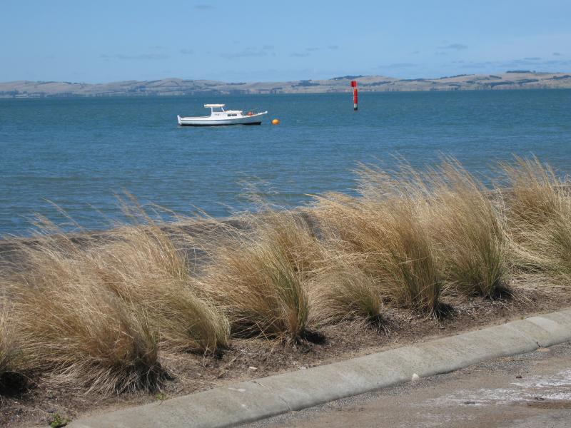Rhyll - Boat ramp, Rhyll Jetty and coast along southern section of Beach Road - View to sea from boat ramp