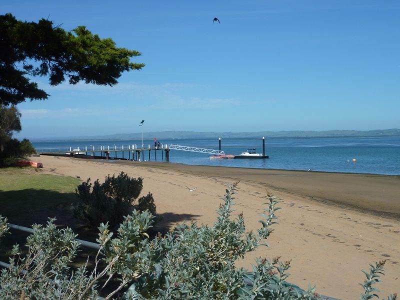 Rhyll - Boat ramp, Rhyll Jetty and coast along southern section of Beach Road: View east along coast towards boat ramp
