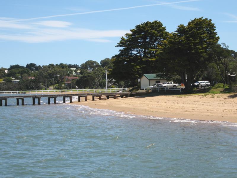 Rhyll - Boat ramp, Rhyll Jetty and coast along southern section of Beach Road: View west along coast towards Rhyll Jetty