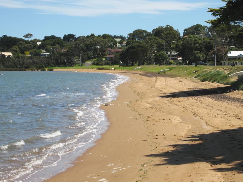 Rhyll - Boat ramp, Rhyll Jetty and coast along southern section of Beach Road: View west along coast, west of Rhyll Jetty