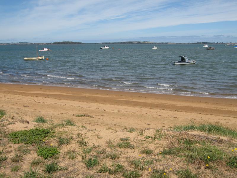 Rhyll - Boat ramp, Rhyll Jetty and coast along southern section of Beach Road - View from beach across bay from near Jansson Rd