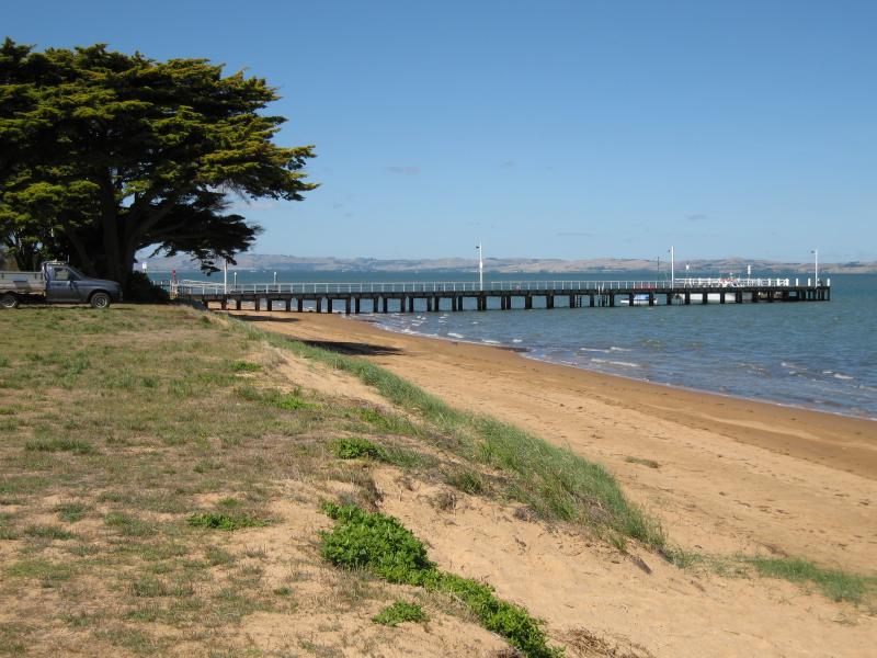 Rhyll - Boat ramp, Rhyll Jetty and coast along southern section of Beach Road: View east along coast towards Rhyll Jetty from near Jansson Rd