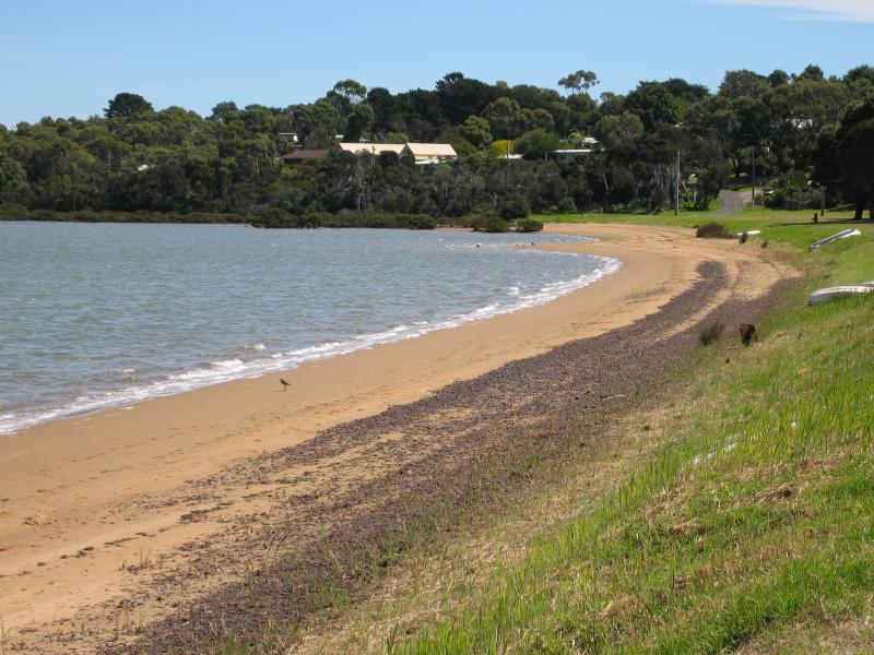 Rhyll - Boat ramp, Rhyll Jetty and coast along southern section of Beach Road: View west along beach and foreshore towards Walton St