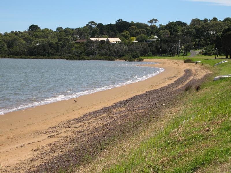 Rhyll - Boat ramp, Rhyll Jetty and coast along southern section of Beach Road - View west along beach and foreshore towards Walton St