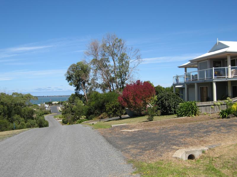 Rhyll - Lady Nelson Point, parkland at the northern end of Beach Rd: View south along Beach Rd at Reid St