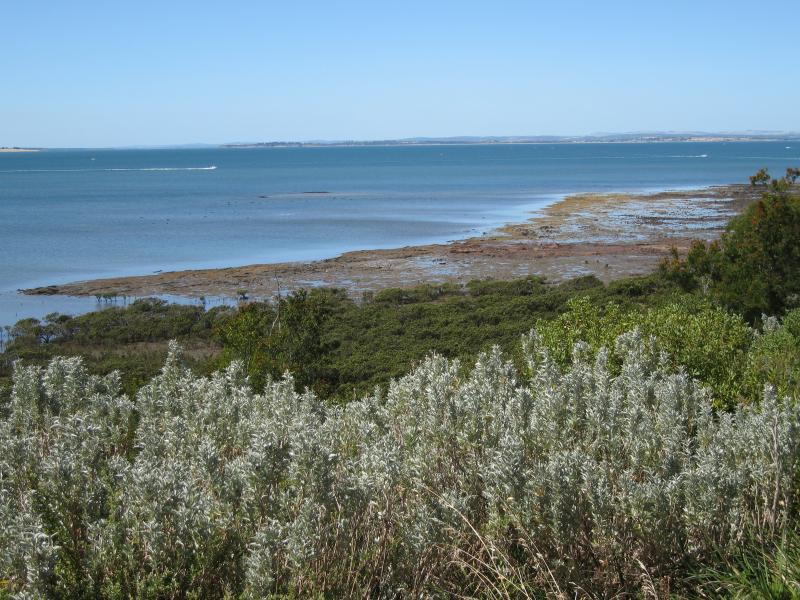 Rhyll - Rhyll Inlet: View east along coast from northern end of Walton St