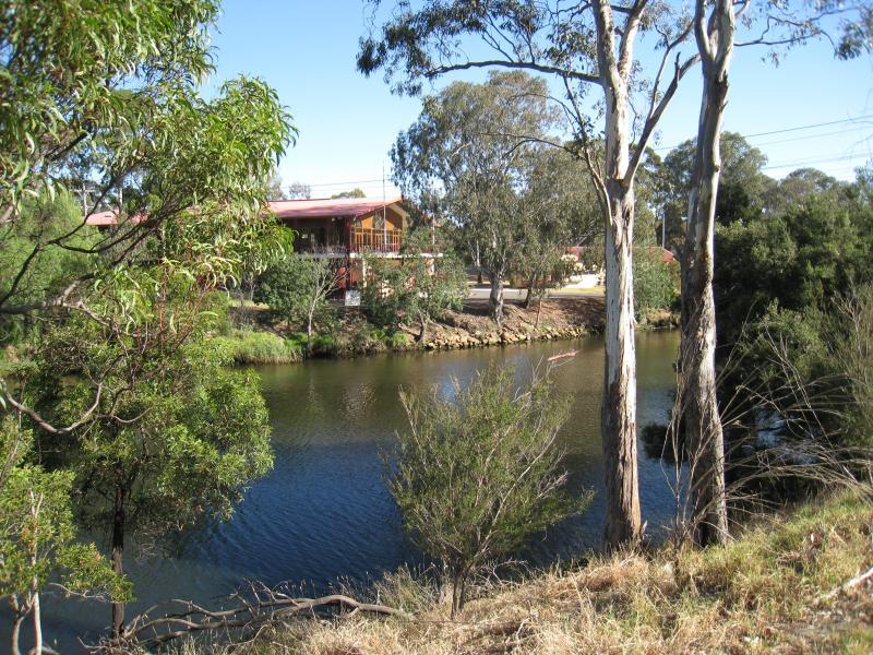 Richmond - Yarra River through loop around Burnley: View south-east across Yarra River north of Monash Fwy overpass