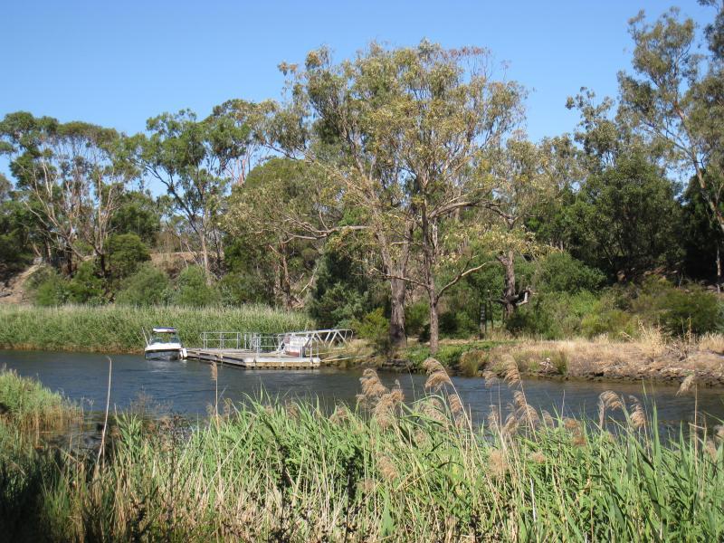 Richmond - Yarra River along southern border of Richmond with South Yarra: View south across Yarra River towards jetty on northern side of Herring Island