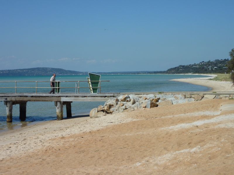 Rosebud - Foreshore reserve and Bay Trail on west side of Rosebud Pier - View east along beach towards entrance of pier