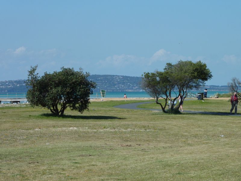 Rosebud - Foreshore reserve and Bay Trail on west side of Rosebud Pier: View across foreshore reserve towards beach and pier