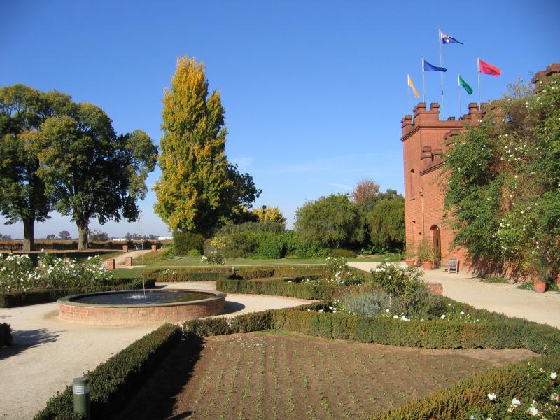 Rutherglen - All Saints Winery, Wahgunyah: Gardens and fountain in front of winery building