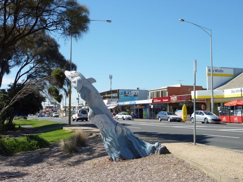 Rye - Commercial centre and shops, Point Nepean Road: Dolphin wood carving, view east along Point Nepean Rd between Napier St and Lyons St