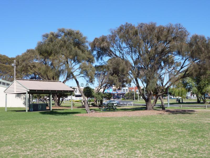 Rye - Foreshore park along Point Nepean Road on east side of Rye Pier: View south-west through foreshore park towards shops opposite pier