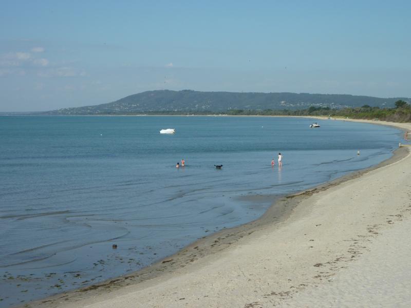 Rye - Beach on east side of Rye Pier: View east across beach towards Arthurs Seat