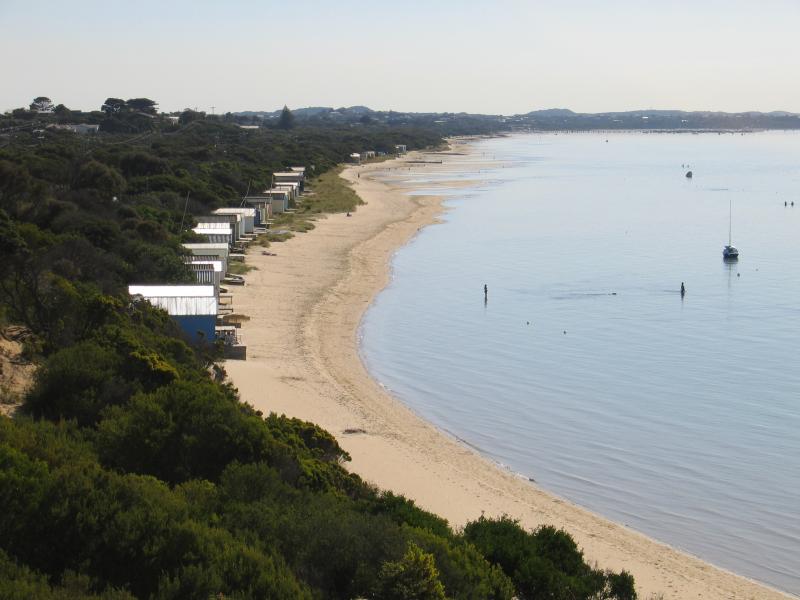Rye - White Cliffs: View west from cliffs towards bathing boxes on beach