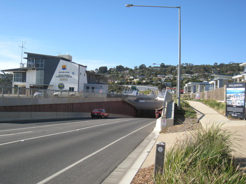 Safety Beach - Martha Cove canal entrance on coast and Marine Drive tunnel: View north along Marine Dr towards tunnel