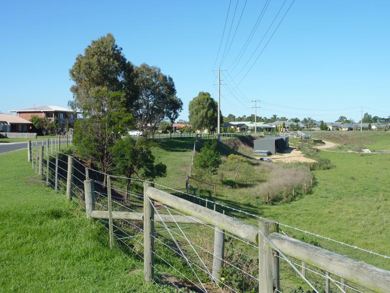 Sale - Stevens Street overlooking flood plain: View east along Stevens St near Yvette Cl