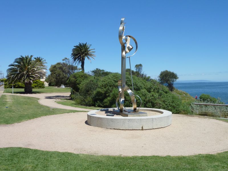 Sandringham - Beach and foreshore park around Sandringham Life Saving Club: South-easterly view through foreshore park towards Windhover sculpture