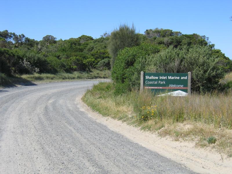 Sandy Point - Shallow Inlet at eastern end of Sandy Point Road: View east along Sandy Point Rd towards entrance to Shallow Inlet Marine & Coastal Park