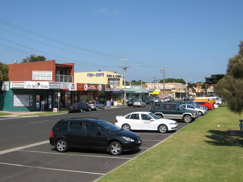 San Remo - Shops and commercial centre, Marine Parade: View west along Marine Pde at Edgar Rd