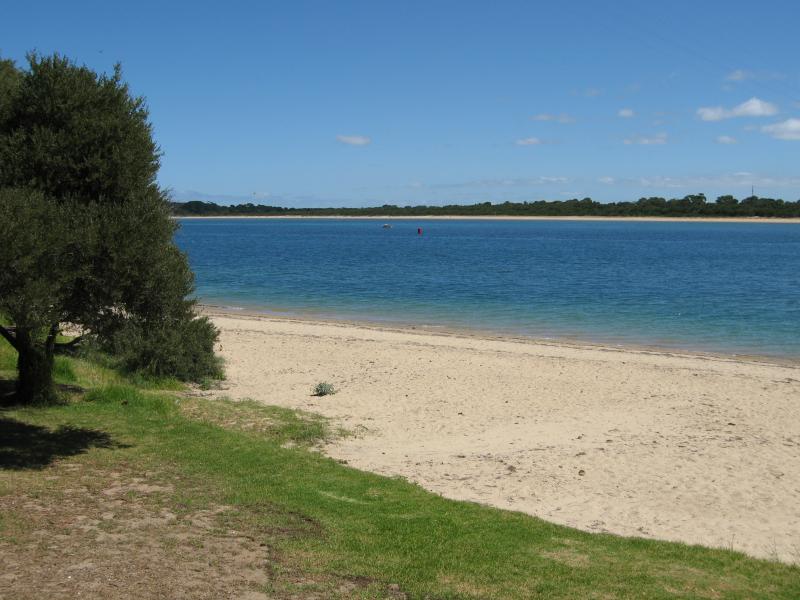 San Remo - Davis Point at western end of Marine Parade: View west across beach
