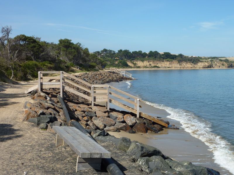 San Remo - Walking track along coast from San Remo Jetty to Back Beach: View south-east along Back Beach and path towards steps down to water
