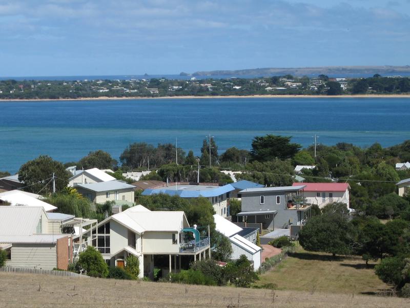 San Remo - Views from Panorama Drive near Anderson Street and Bonwick Avenue: View west across water towards housing at Cape Woolamai