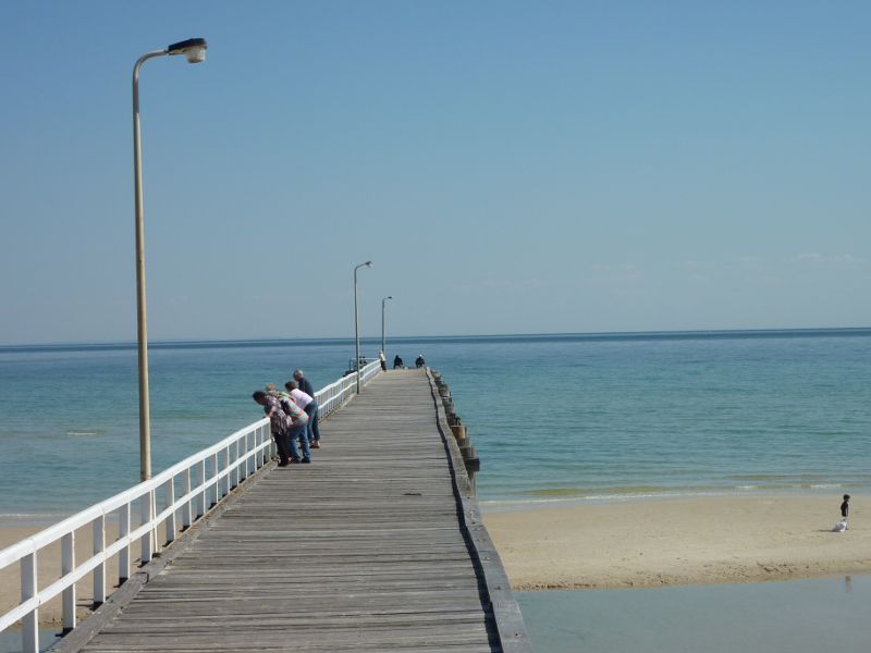 Seaford - Seaford Pier and surrounding beaches: View along pier out into the bay
