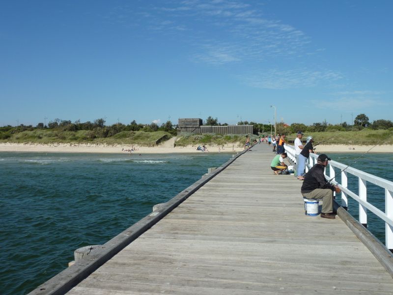 Seaford - Seaford Pier and surrounding beaches: View along pier towards beach