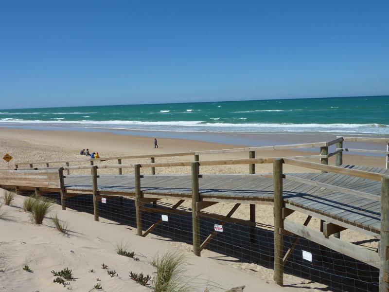 Seaspray - Beach at Seaspray Surf Life Saving Club, off Foreshore Road: Easterly view across beach from walkway