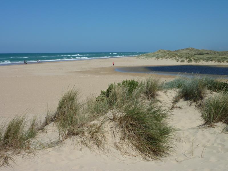 Seaspray - Beach at south-western end of Foreshore Road and mouth of Merriman Creek: View south-west along beach towards creek