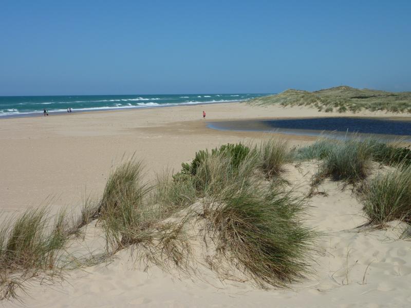 Seaspray - Beach at south-western end of Foreshore Road and mouth of Merriman Creek - View south-west along beach towards creek