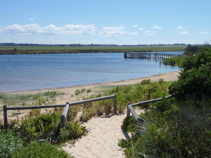 Seaspray - Merriman Creek and fishing platform at the park at end of Foreshore Road: View north-west across creek from beach towards fishing platform