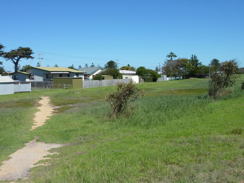 Seaspray - Reserve north of Buckley Street, along Merriman Creek and The Island: View south-west through reserve behind houses along Buckley St