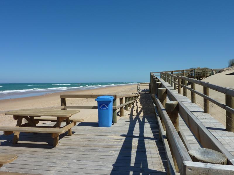 Seaspray - Beach at Shoreline Drive opposite Centre Road: View south-west along beach from decking at walkway