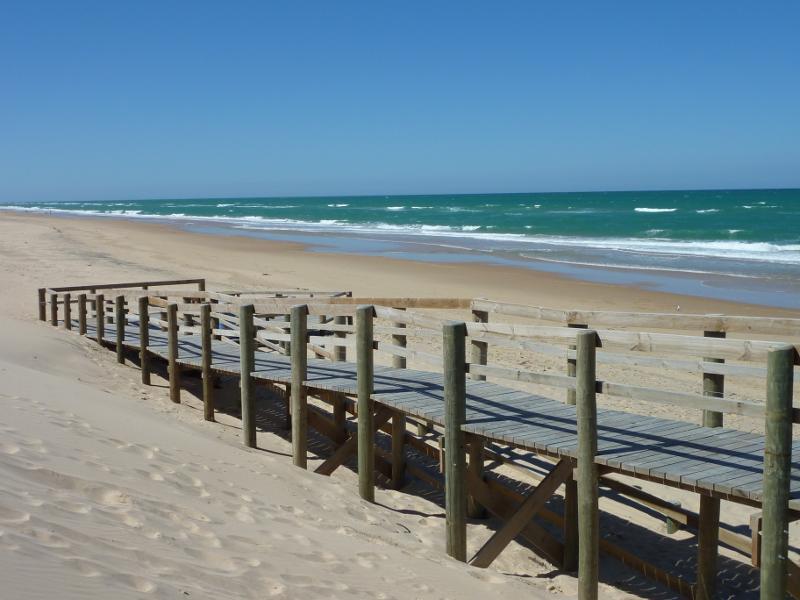 Seaspray - Beach at Shoreline Drive opposite Centre Road: View east across beach at walkway