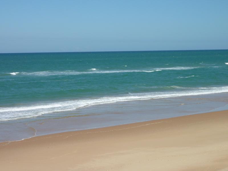 Seaspray - The Honeysuckles, beach along Shoreline Drive opposite Mandalay Drive: View across beach towards ocean