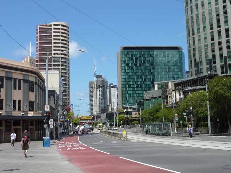 Southbank - Queensbridge Square, Sandridge Bridge and Yarra River: Southerly view along Queens Bridge St at Queensbridge Square