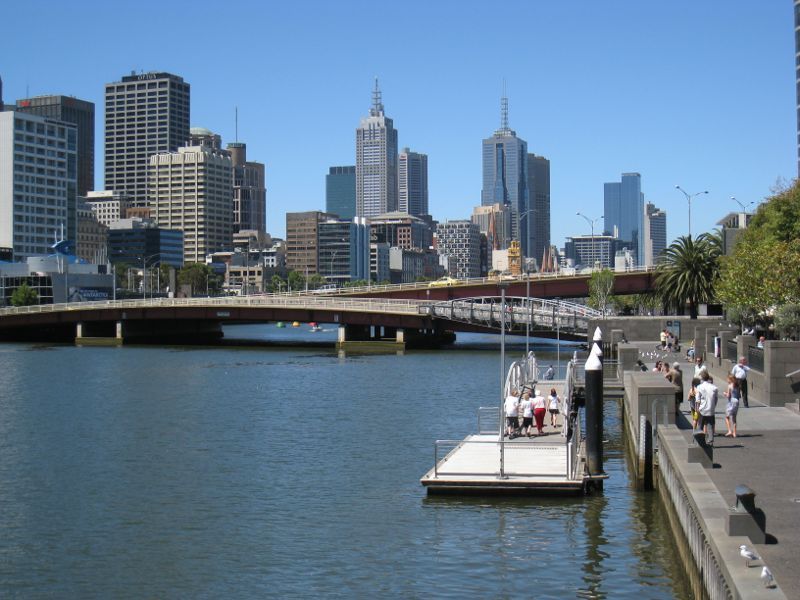 Southbank - Yarra Promenade and Yarra River: View east along Yarra river towards Kings Bridge and city skyline