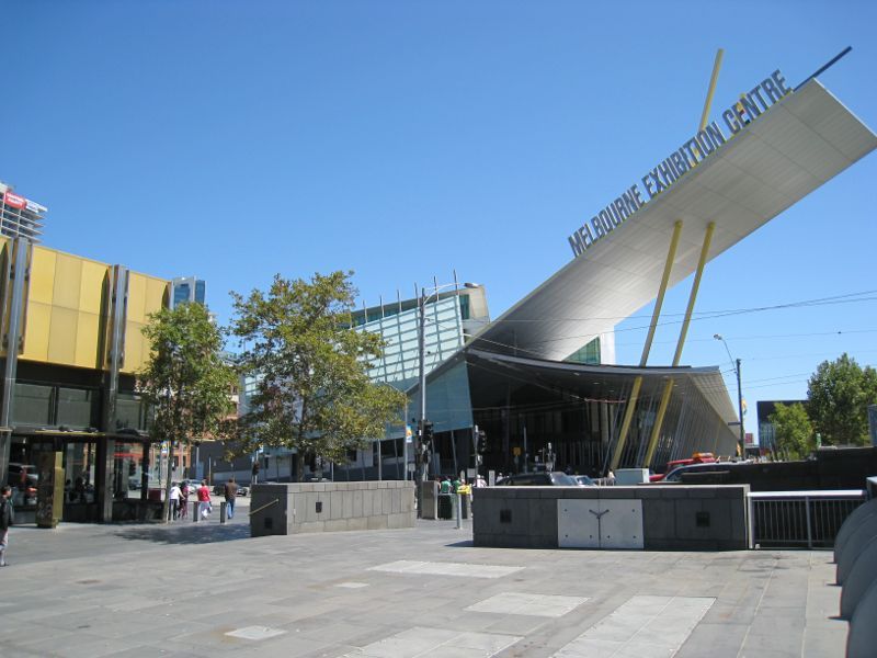 Southbank - Yarra Promenade and Yarra River: View west along Yarra Promenade towards Clarendon St and Melbourne Exhibition Centre