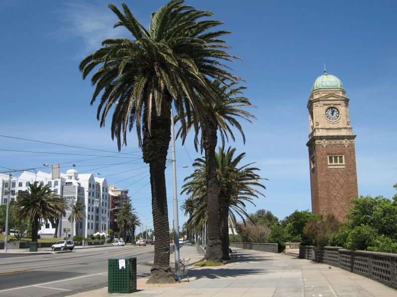 St Kilda - The Esplanade: South-easterly view along The Esplanade towards Novotel St Kilda and Catani Clocktower