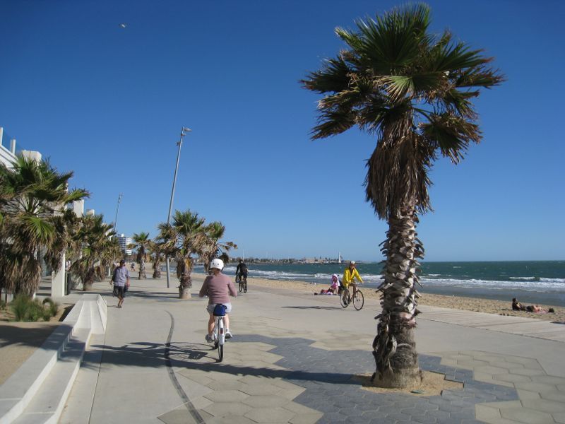 St Kilda - St Kilda Beach, Brooks Jetty and foreshore gardens - View south-east along beach boardwalk in front of St Kilda Sea Baths