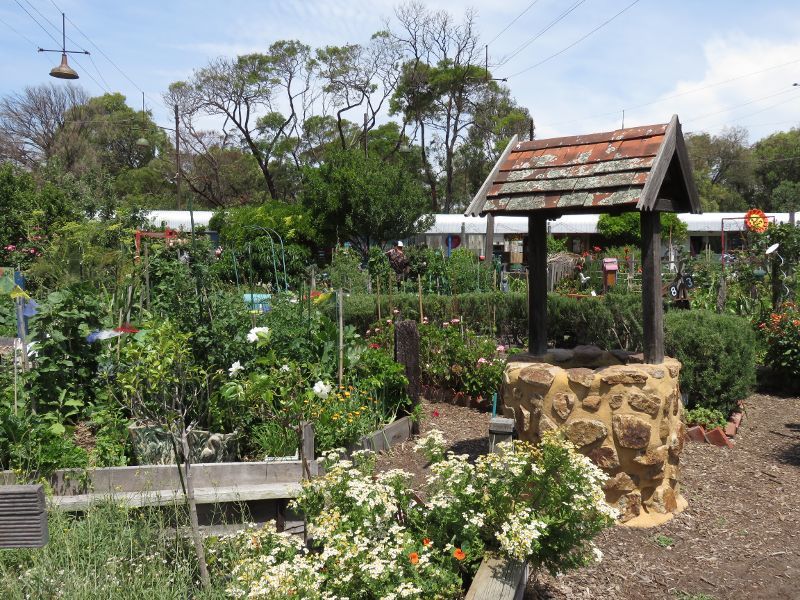 St Kilda - Veg Out Community Gardens, Shakespeare Grove: Wishing well amongst garden beds