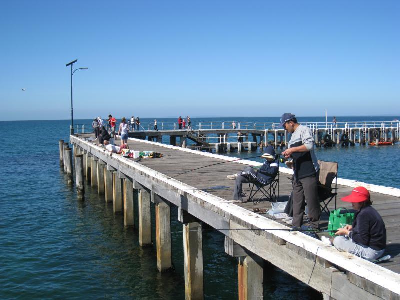 St Leonards - St Leonards Pier, eastern end of Murradoc Road: People fishing off pier