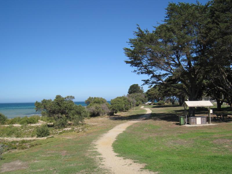 St Leonards - Harvey Park and foreshore reserve between Murradoc Road and Dudley Parade: View south along path through foreshore reserve towards BBQ shelter