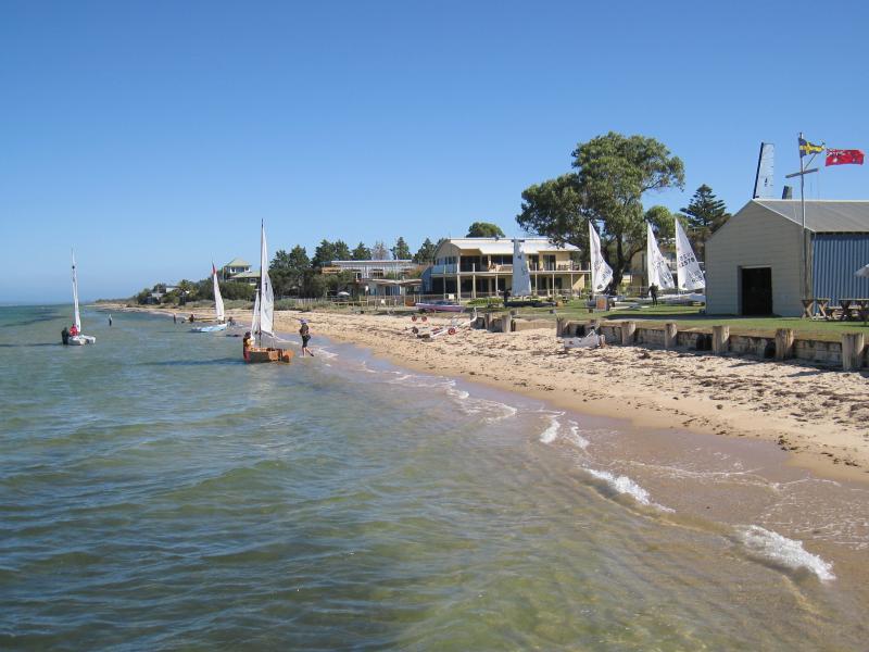 St Leonards - Yacht club and surrounding foreshore, southern end of Lower Bluff Road: View south along beach from jetty