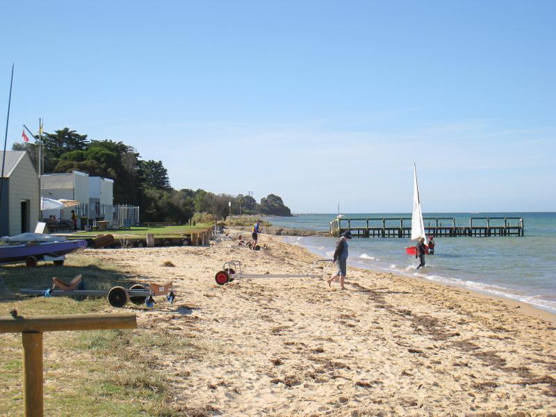 St Leonards - Yacht club and surrounding foreshore, southern end of Lower Bluff Road: View north along beach at yacht club towards jetty
